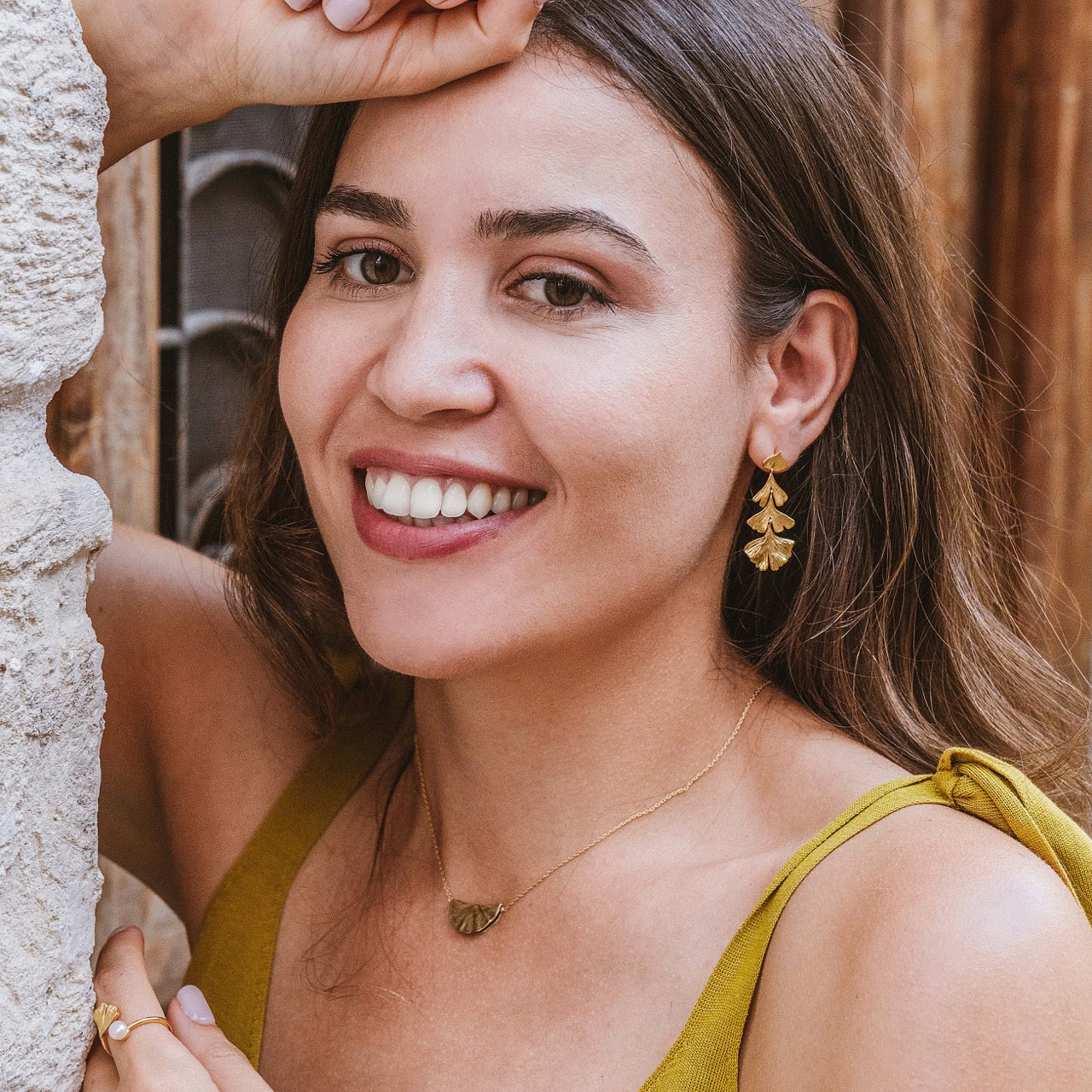 Ginkgo long earrings in gold vermeil worn showing cascading length