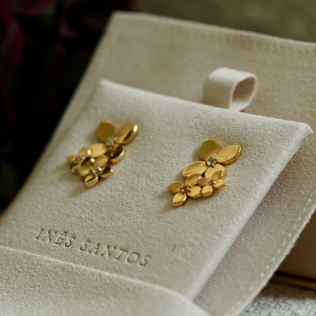 Bloom trio earrings on Inês Santos branded earring hanger inside light beige velvet pouch