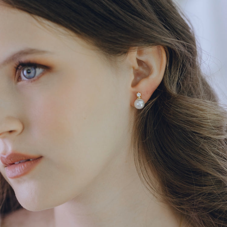 Pearl Obsession studs styled showing white topaz sparkle and pearl luster combination