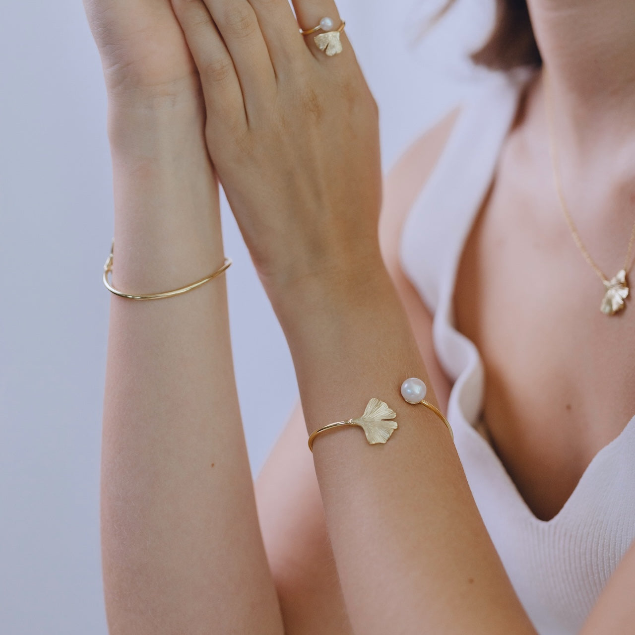 Ginkgo collection pearl bracelet styled showing delicate leaf and pearl combination