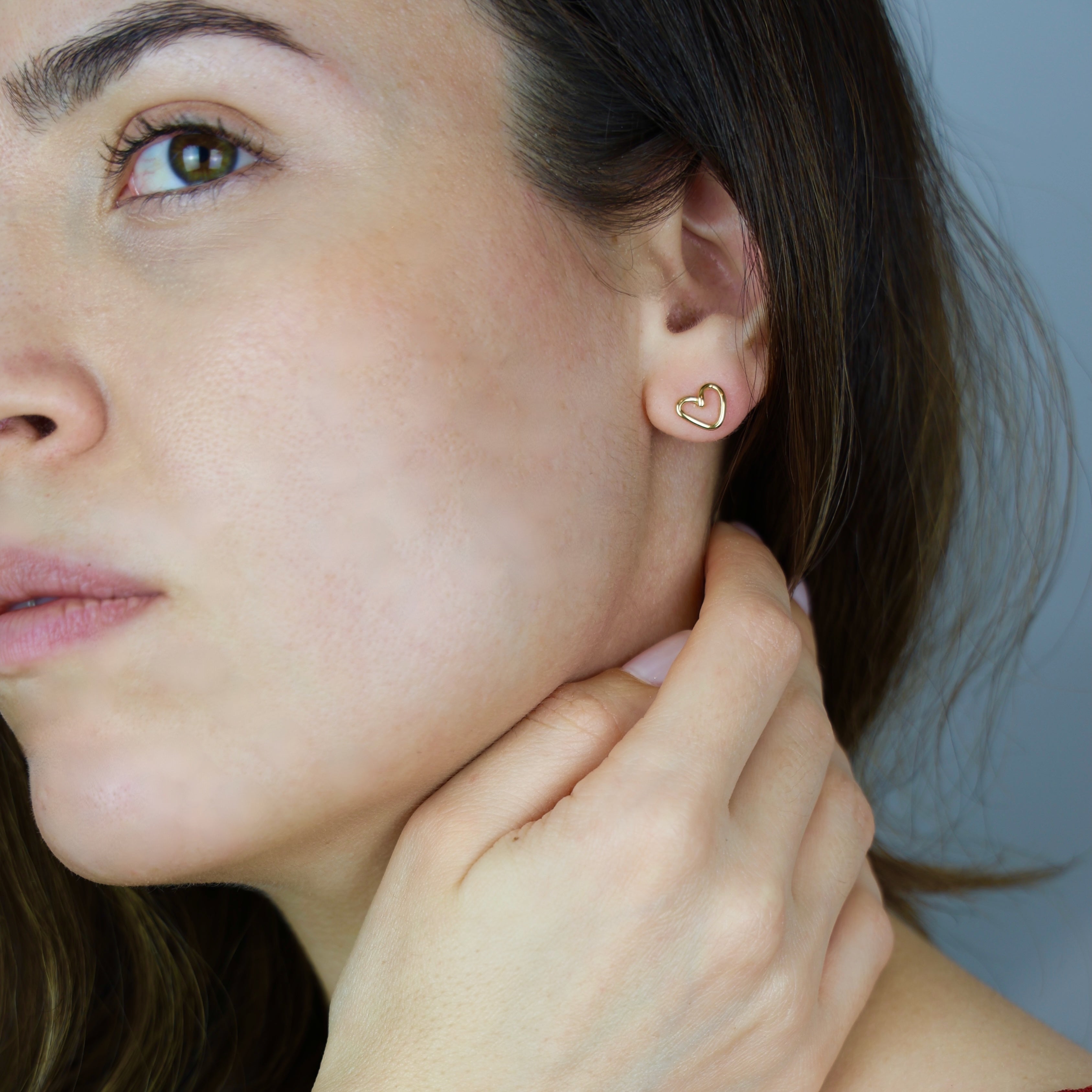 Amore collection heart earrings styled showing elegant minimalist heart design