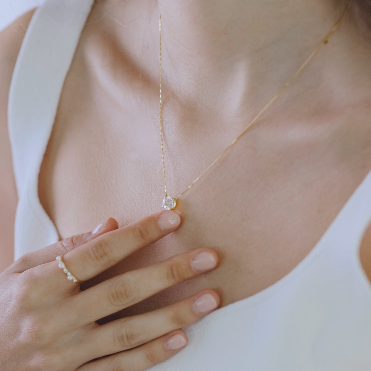 Sleek collection topaz necklace in gold vermeil worn on neck