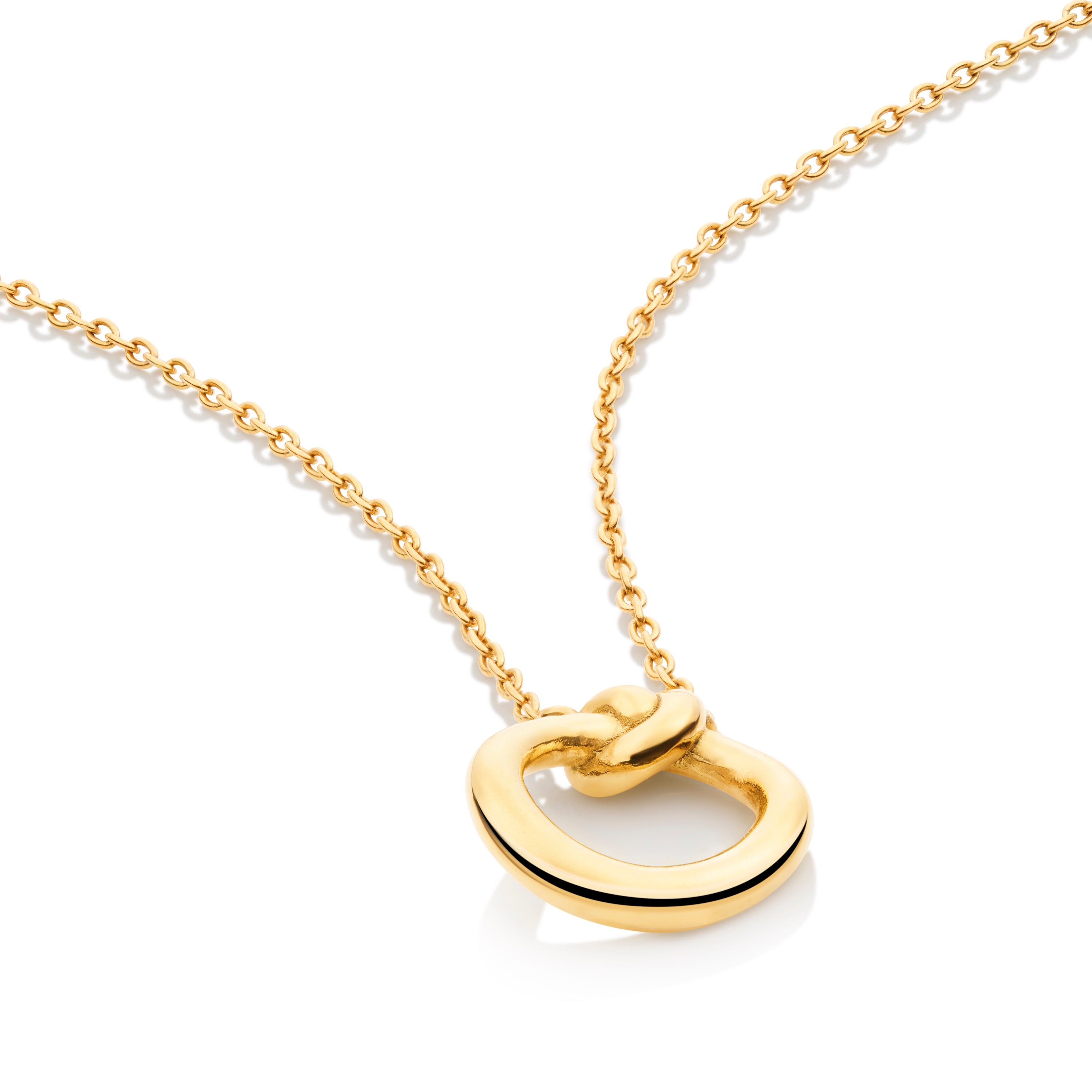 Close-up of Knot necklace showing organic rope-like circular knot design