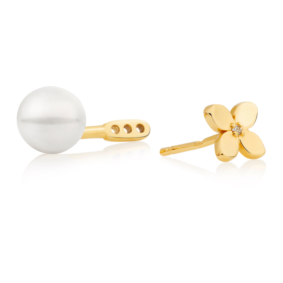 Gold vermeil earring with a pearl and earring with a flower design on a white background