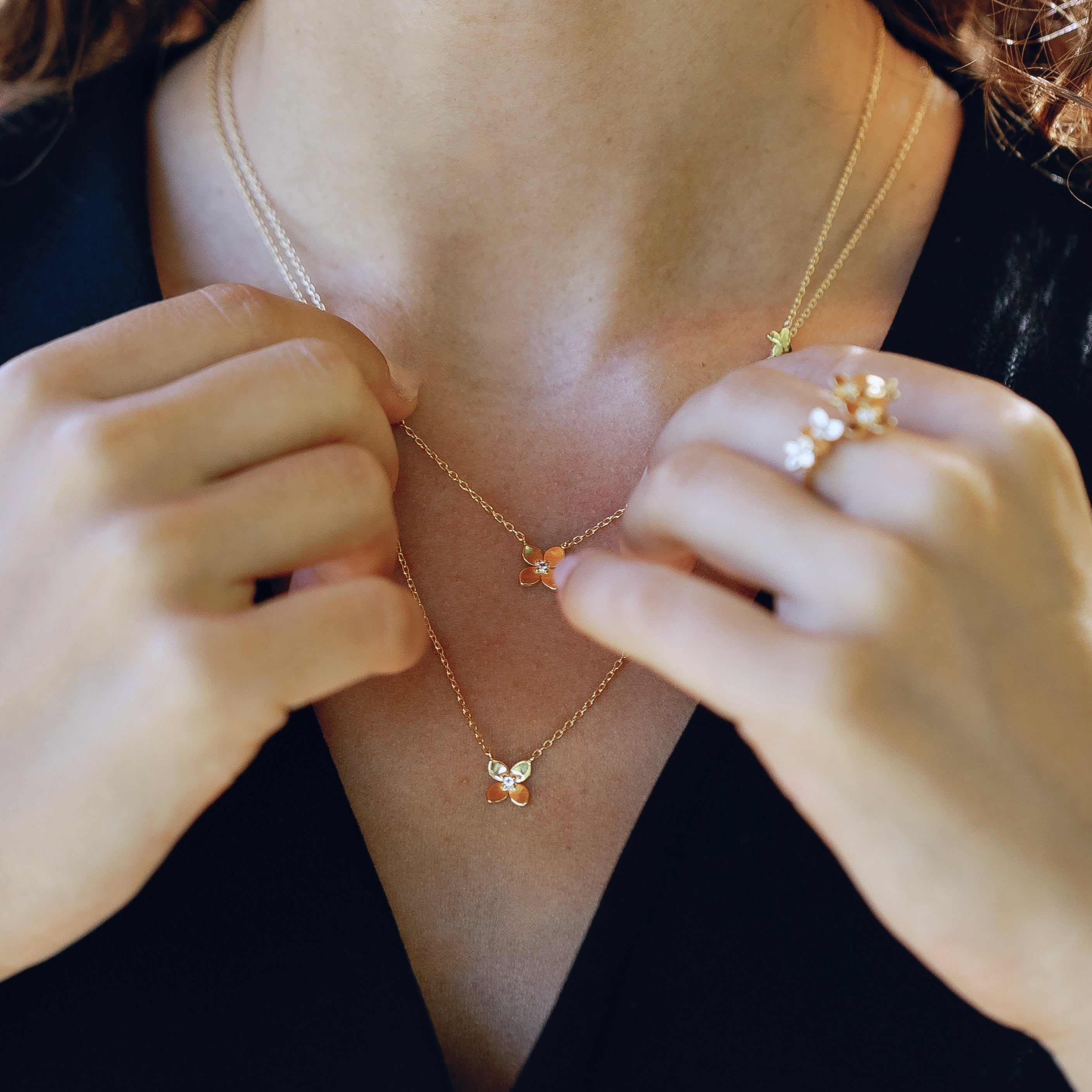 Bloom collection flower necklace styled showing delicate petal pendant design