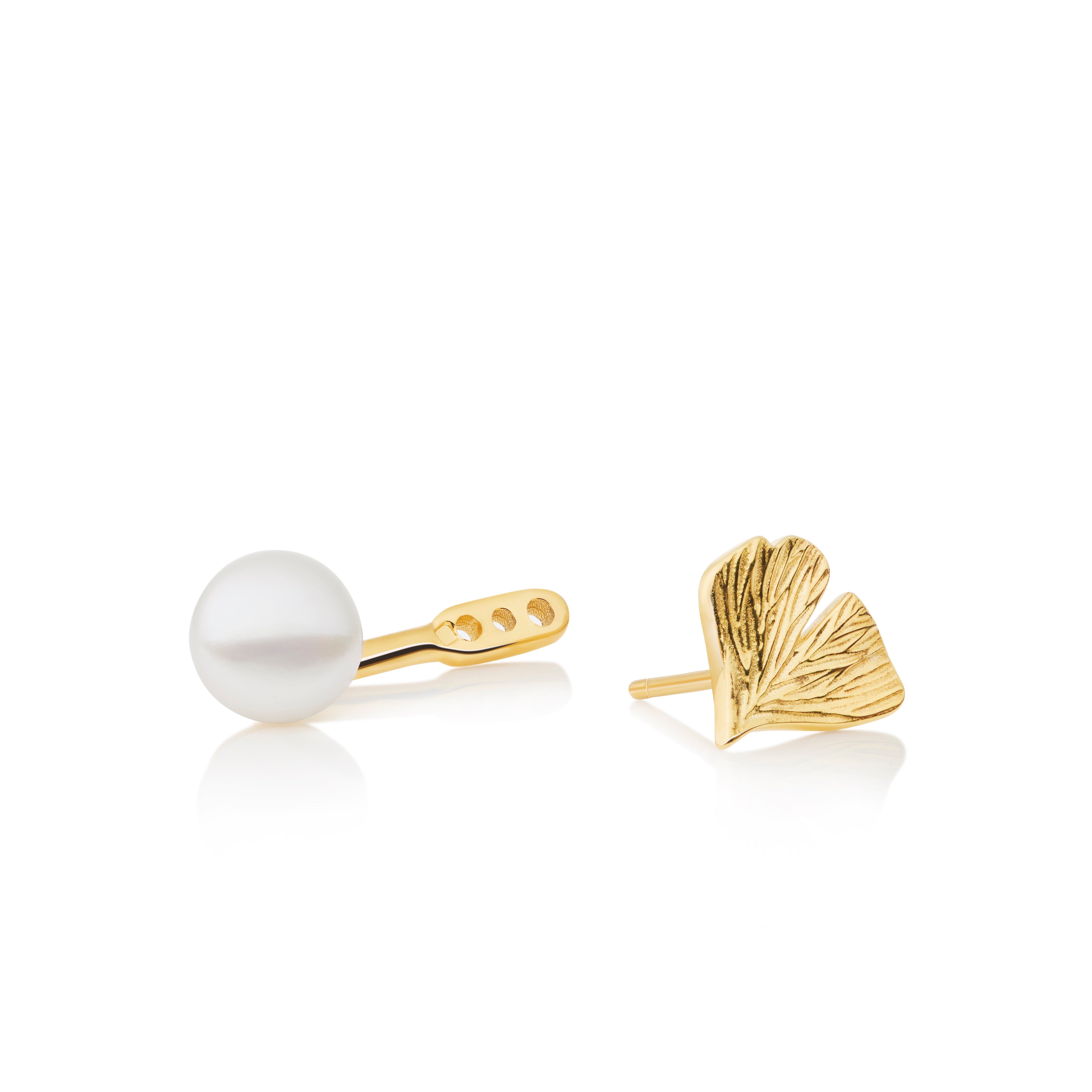 Pearl drop enhancers styled with Ginkgo stud earrings showing versatile attachment option