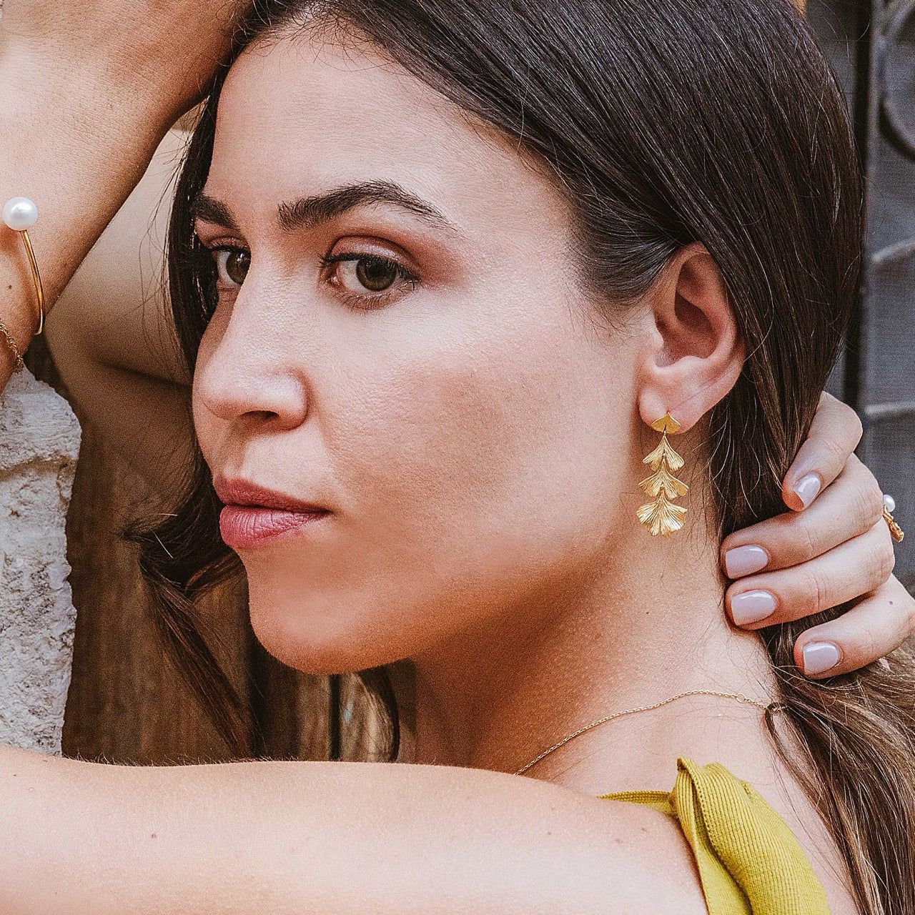 Side view of Ginkgo long earrings showing fan-shaped leaf details