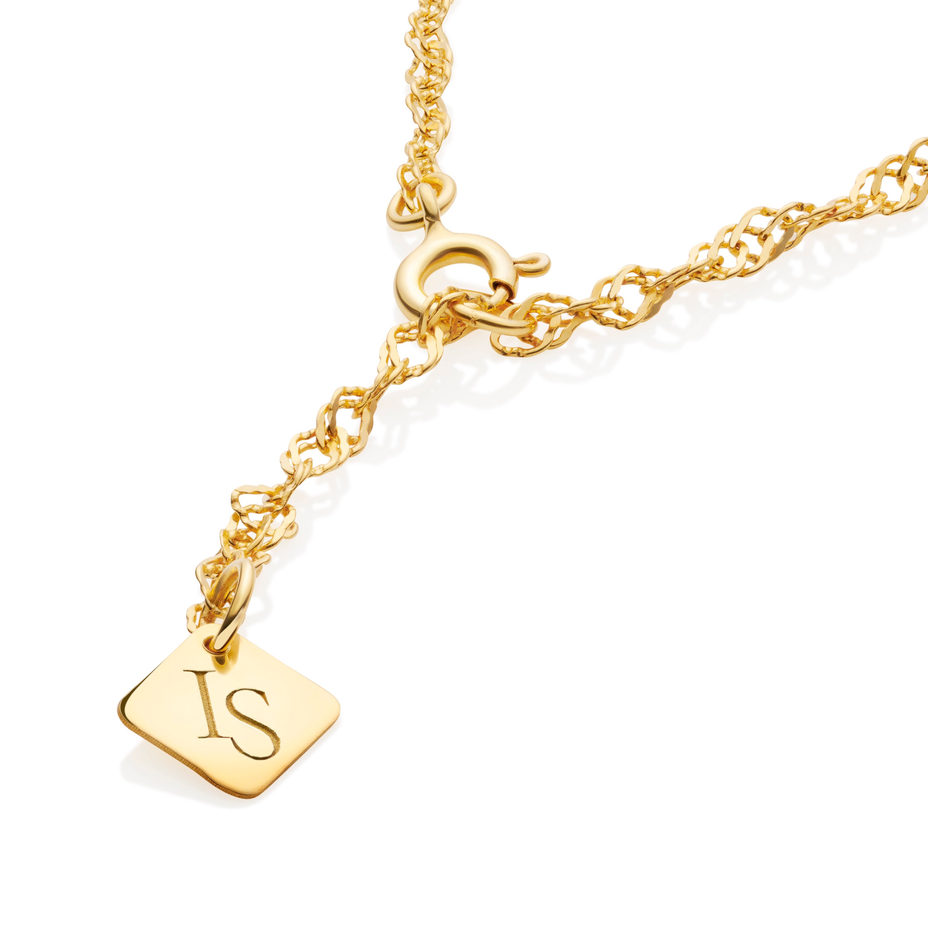 Close-up of twisted chain necklace showing Inês Santos logo and chain texture detail