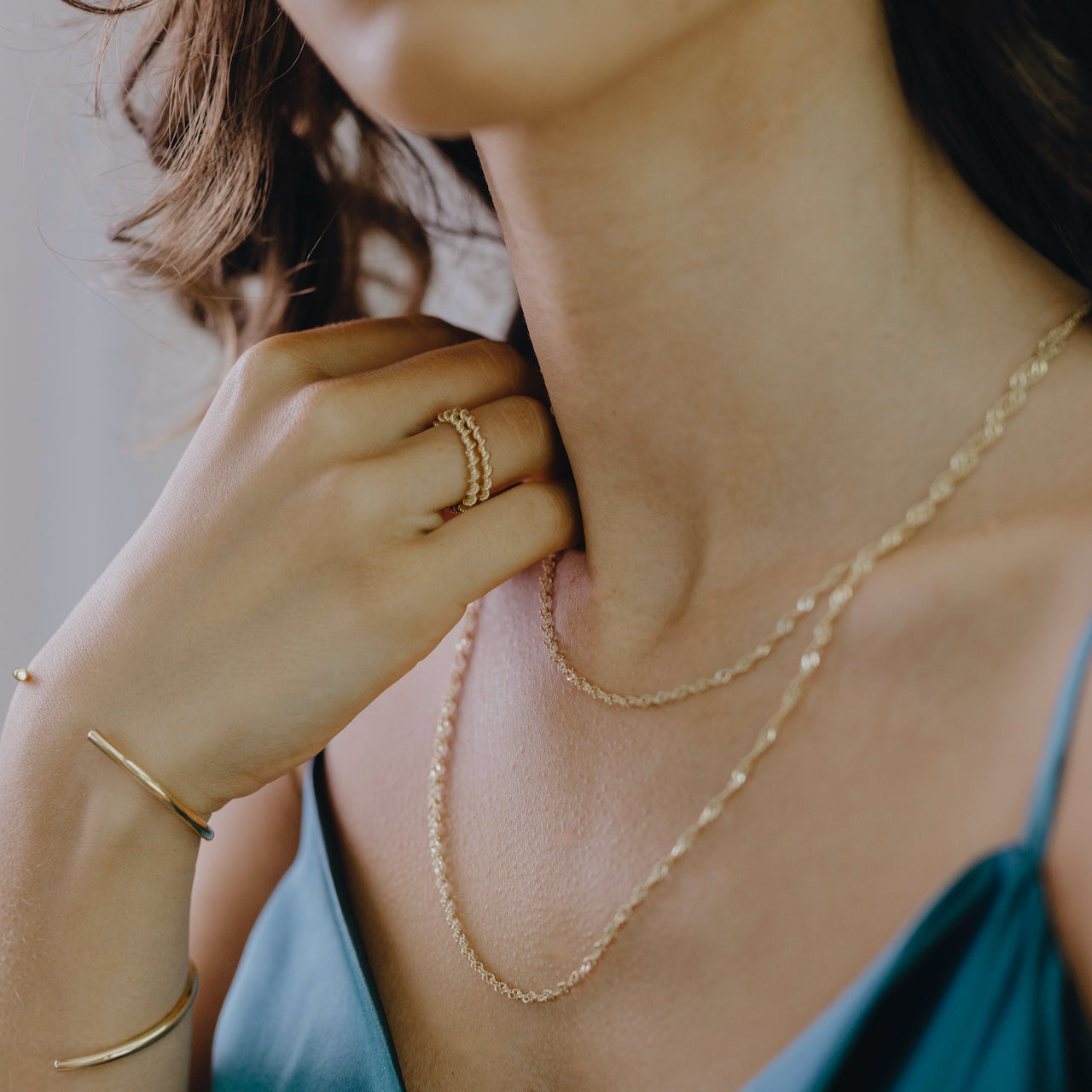 Sleek collection twist ring styled showing modern band detail