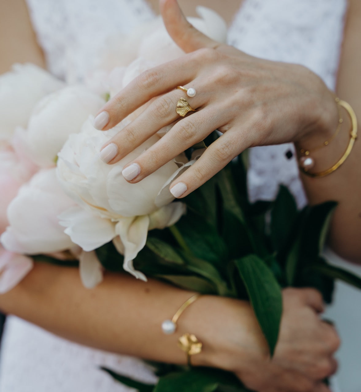Ginkgo and pearl ring in gold vermeil worn on finger