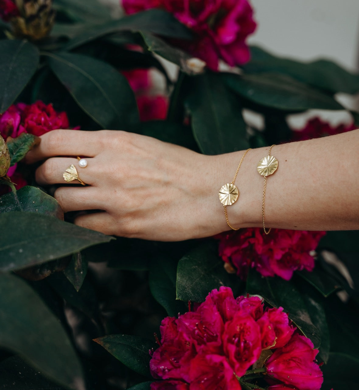 Water lily leaf bracelet in gold vermeil worn on wrist
